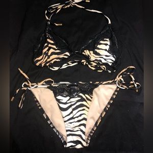 Victoria secret tiger print and lace bikini. Top is a size XS and bottoms are S.
